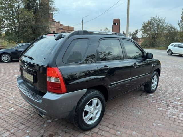 Чорний Кіа Sportage, об'ємом двигуна 2 л та пробігом 180 тис. км за 6700 $, фото 8 на Automoto.ua