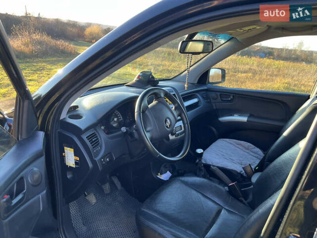 Чорний Кіа Sportage, об'ємом двигуна 1.99 л та пробігом 281 тис. км за 7600 $, фото 6 на Automoto.ua