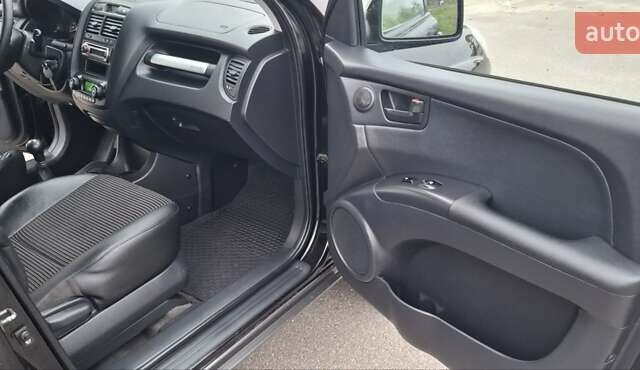 Черный Киа Sportage, объемом двигателя 2 л и пробегом 170 тыс. км за 8700 $, фото 18 на Automoto.ua