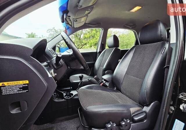 Чорний Кіа Sportage, об'ємом двигуна 2 л та пробігом 172 тис. км за 7999 $, фото 41 на Automoto.ua