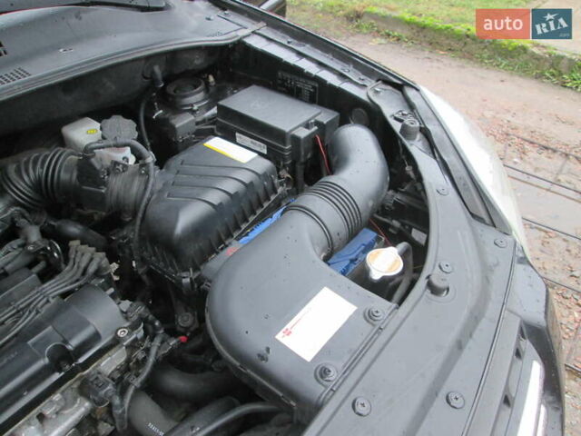 Черный Киа Sportage, объемом двигателя 2 л и пробегом 213 тыс. км за 7700 $, фото 31 на Automoto.ua