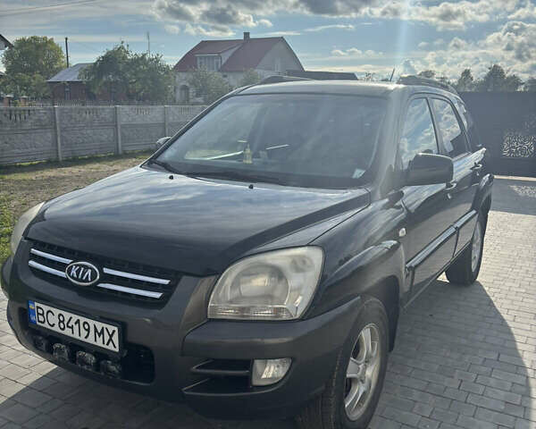 Черный Киа Sportage, объемом двигателя 2 л и пробегом 300 тыс. км за 6800 $, фото 1 на Automoto.ua