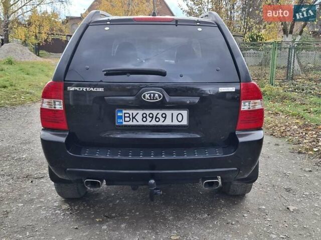 Черный Киа Sportage, объемом двигателя 1.99 л и пробегом 283 тыс. км за 6850 $, фото 4 на Automoto.ua