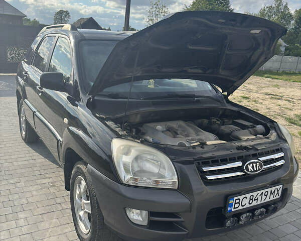 Черный Киа Sportage, объемом двигателя 2 л и пробегом 300 тыс. км за 6800 $, фото 11 на Automoto.ua