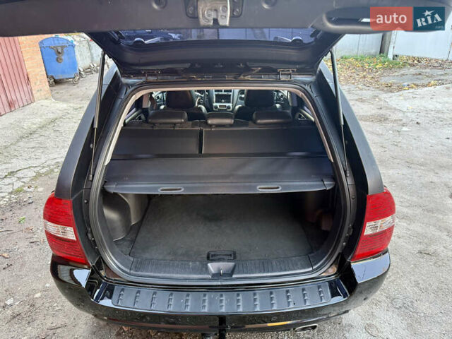 Черный Киа Sportage, объемом двигателя 2 л и пробегом 159 тыс. км за 7650 $, фото 22 на Automoto.ua