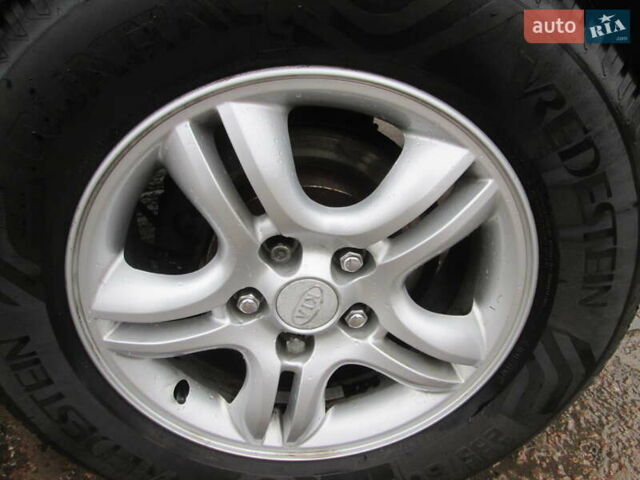 Черный Киа Sportage, объемом двигателя 2 л и пробегом 213 тыс. км за 7700 $, фото 10 на Automoto.ua