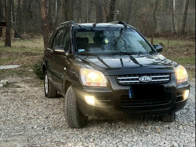 Чорний Кіа Sportage, об'ємом двигуна 2 л та пробігом 200 тис. км за 3950 $, фото 1 на Automoto.ua