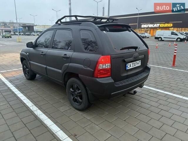 Черный Киа Sportage, объемом двигателя 2 л и пробегом 322 тыс. км за 7000 $, фото 2 на Automoto.ua