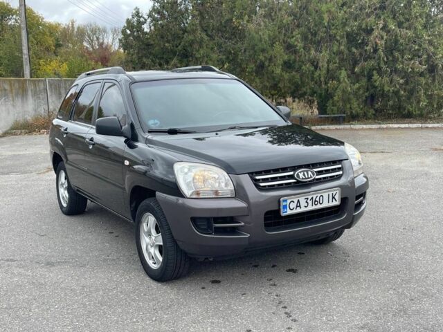 Черный Киа Sportage, объемом двигателя 2 л и пробегом 202 тыс. км за 6500 $, фото 2 на Automoto.ua