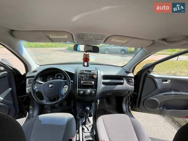 Чорний Кіа Sportage, об'ємом двигуна 1.98 л та пробігом 200 тис. км за 7900 $, фото 18 на Automoto.ua