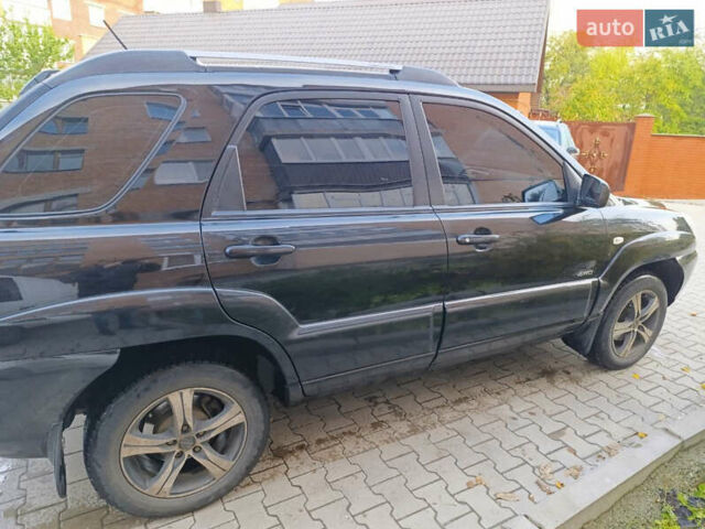 Чорний Кіа Sportage, об'ємом двигуна 1.98 л та пробігом 232 тис. км за 7900 $, фото 6 на Automoto.ua