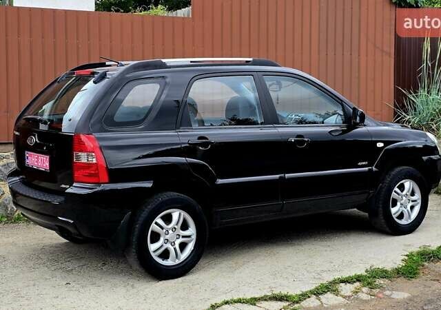 Чорний Кіа Sportage, об'ємом двигуна 2 л та пробігом 172 тис. км за 7999 $, фото 16 на Automoto.ua