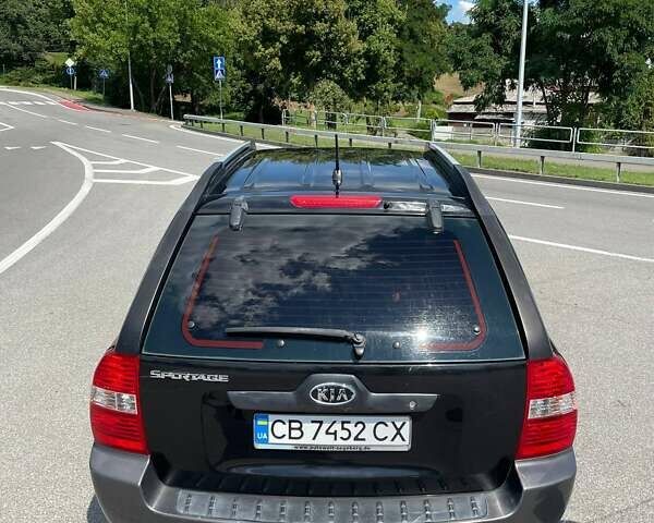 Чорний Кіа Sportage, об'ємом двигуна 1.98 л та пробігом 200 тис. км за 7900 $, фото 7 на Automoto.ua