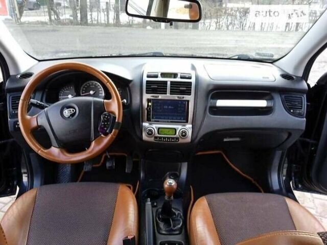 Черный Киа Sportage, объемом двигателя 1.98 л и пробегом 202 тыс. км за 7300 $, фото 12 на Automoto.ua