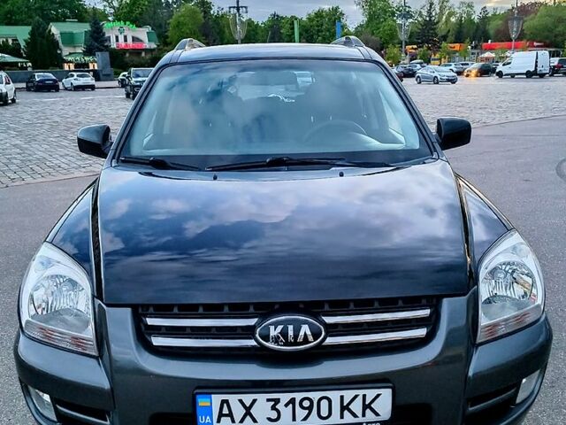 Черный Киа Sportage, объемом двигателя 2 л и пробегом 196 тыс. км за 7500 $, фото 2 на Automoto.ua