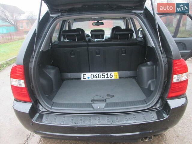 Черный Киа Sportage, объемом двигателя 2 л и пробегом 213 тыс. км за 7700 $, фото 20 на Automoto.ua