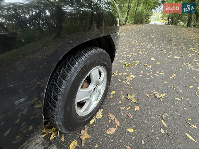 Киа Sportage 2006 в Львове на Automoto.ua Черный Киа Sportage, объемом двигателя 2 л и пробегом 182 тыс. км за 6250 $, фото 43 на Automoto.ua