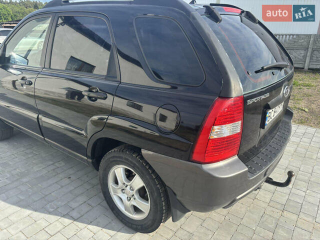 Черный Киа Sportage, объемом двигателя 2 л и пробегом 300 тыс. км за 6800 $, фото 3 на Automoto.ua