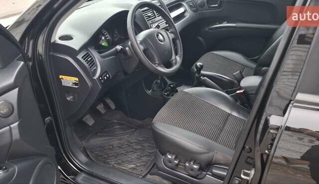 Черный Киа Sportage, объемом двигателя 2 л и пробегом 170 тыс. км за 8700 $, фото 12 на Automoto.ua