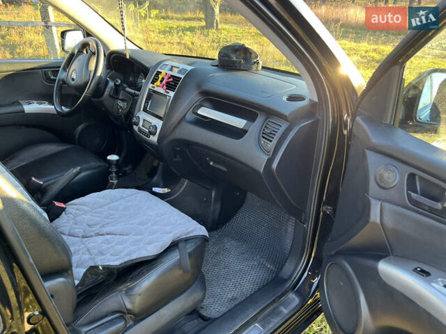Чорний Кіа Sportage, об'ємом двигуна 1.99 л та пробігом 281 тис. км за 7600 $, фото 8 на Automoto.ua