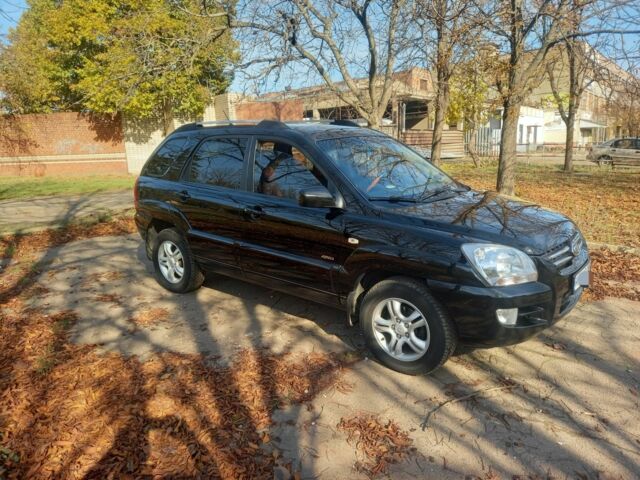 Чорний Кіа Sportage, об'ємом двигуна 2 л та пробігом 263 тис. км за 8100 $, фото 1 на Automoto.ua