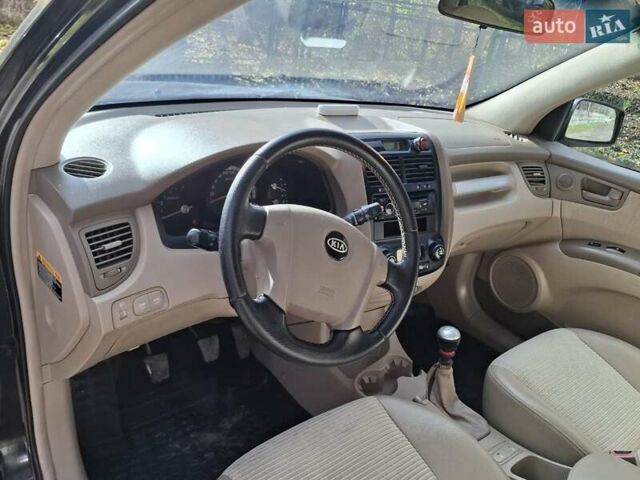 Черный Киа Sportage, объемом двигателя 1.99 л и пробегом 283 тыс. км за 6850 $, фото 20 на Automoto.ua