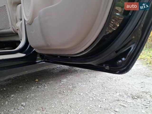 Черный Киа Sportage, объемом двигателя 1.99 л и пробегом 283 тыс. км за 6850 $, фото 47 на Automoto.ua