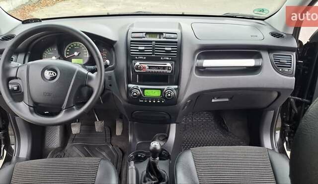 Черный Киа Sportage, объемом двигателя 2 л и пробегом 170 тыс. км за 8700 $, фото 19 на Automoto.ua