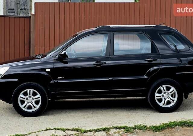 Чорний Кіа Sportage, об'ємом двигуна 2 л та пробігом 172 тис. км за 7999 $, фото 29 на Automoto.ua