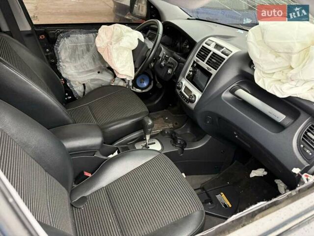 Черный Киа Sportage, объемом двигателя 1.99 л и пробегом 219 тыс. км за 3300 $, фото 13 на Automoto.ua