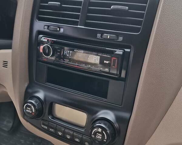 Черный Киа Sportage, объемом двигателя 1.99 л и пробегом 283 тыс. км за 6850 $, фото 53 на Automoto.ua