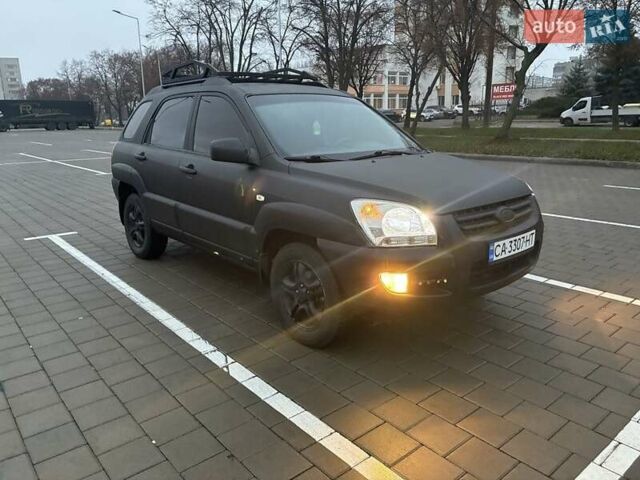 Черный Киа Sportage, объемом двигателя 2 л и пробегом 322 тыс. км за 7000 $, фото 1 на Automoto.ua