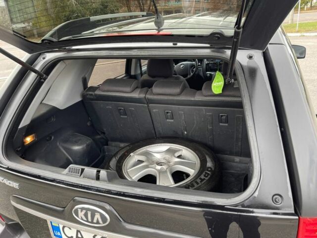 Черный Киа Sportage, объемом двигателя 2 л и пробегом 202 тыс. км за 6500 $, фото 9 на Automoto.ua
