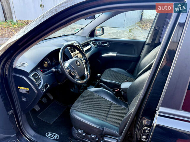 Черный Киа Sportage, объемом двигателя 2 л и пробегом 159 тыс. км за 7650 $, фото 11 на Automoto.ua