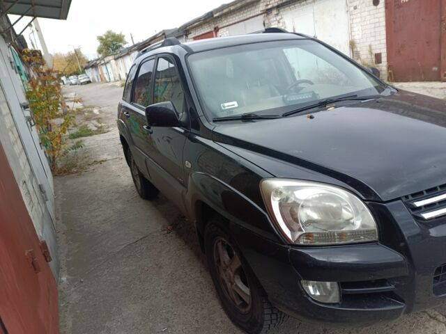 Черный Киа Sportage, объемом двигателя 2 л и пробегом 307 тыс. км за 4800 $, фото 4 на Automoto.ua