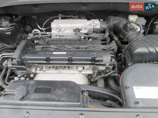 Черный Киа Sportage, объемом двигателя 2 л и пробегом 213 тыс. км за 7700 $, фото 30 на Automoto.ua