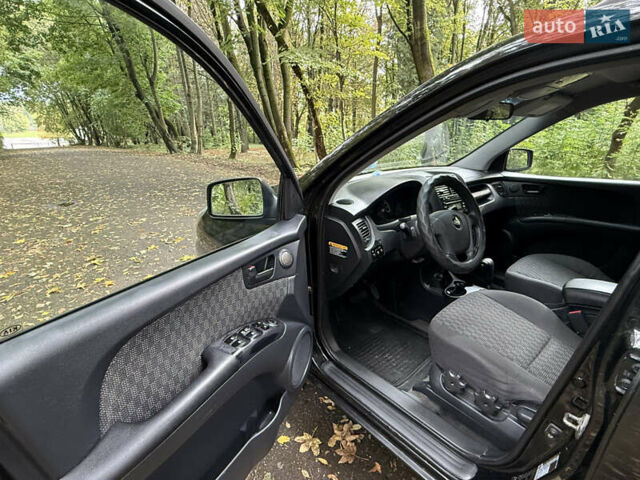 Киа Sportage 2006 в Львове на Automoto.ua Черный Киа Sportage, объемом двигателя 2 л и пробегом 182 тыс. км за 6250 $, фото 18 на Automoto.ua