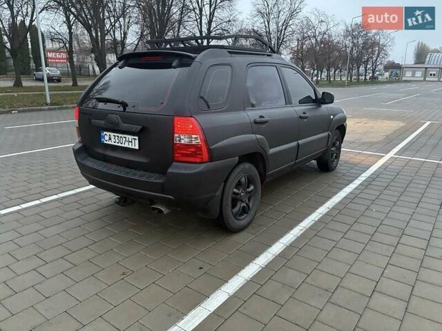 Черный Киа Sportage, объемом двигателя 2 л и пробегом 322 тыс. км за 7000 $, фото 3 на Automoto.ua