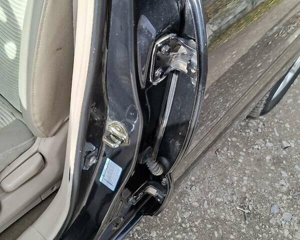 Черный Киа Sportage, объемом двигателя 1.99 л и пробегом 283 тыс. км за 6850 $, фото 26 на Automoto.ua