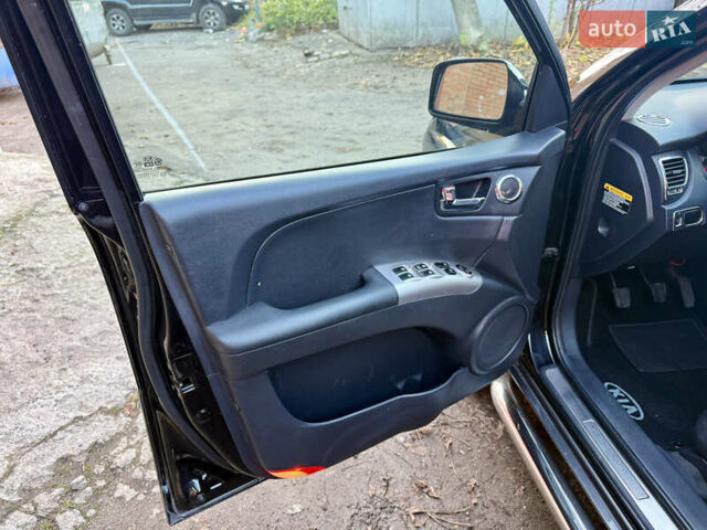 Черный Киа Sportage, объемом двигателя 2 л и пробегом 159 тыс. км за 7650 $, фото 12 на Automoto.ua