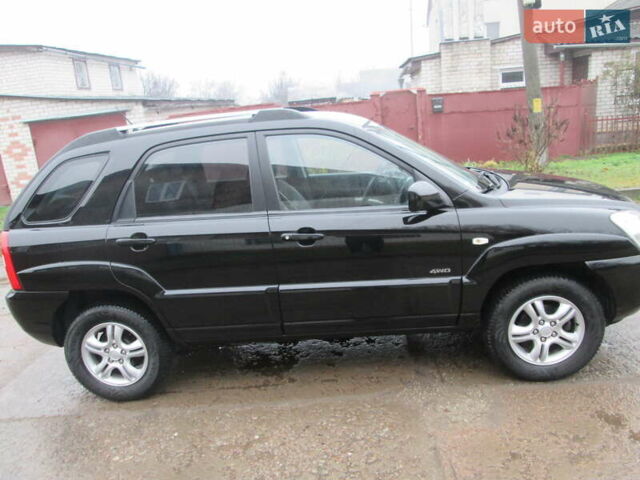 Черный Киа Sportage, объемом двигателя 2 л и пробегом 213 тыс. км за 7700 $, фото 2 на Automoto.ua