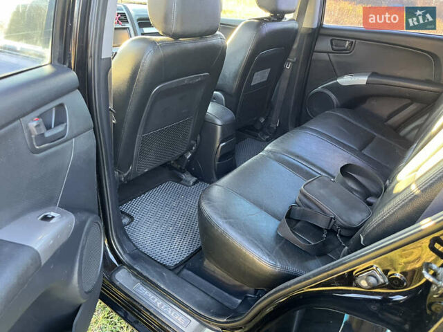 Чорний Кіа Sportage, об'ємом двигуна 1.99 л та пробігом 281 тис. км за 7600 $, фото 7 на Automoto.ua
