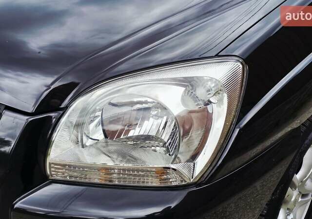 Чорний Кіа Sportage, об'ємом двигуна 2 л та пробігом 172 тис. км за 7999 $, фото 33 на Automoto.ua