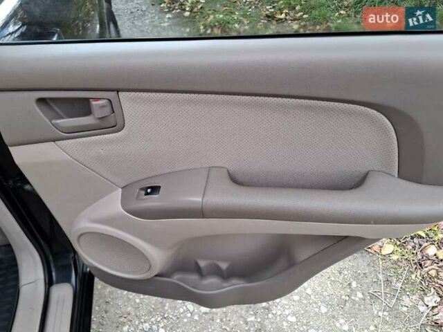 Черный Киа Sportage, объемом двигателя 1.99 л и пробегом 283 тыс. км за 6850 $, фото 46 на Automoto.ua