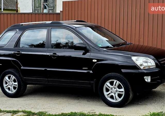 Чорний Кіа Sportage, об'ємом двигуна 2 л та пробігом 172 тис. км за 7999 $, фото 12 на Automoto.ua