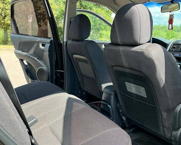 Чорний Кіа Sportage, об'ємом двигуна 1.98 л та пробігом 200 тис. км за 7900 $, фото 17 на Automoto.ua