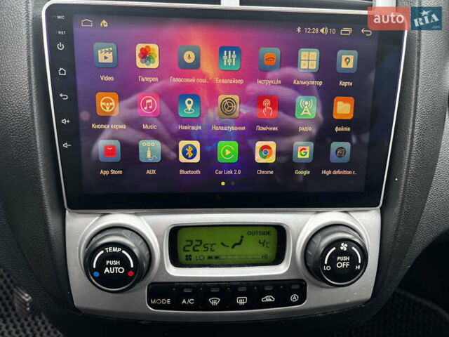 Чорний Кіа Sportage, об'ємом двигуна 2 л та пробігом 250 тис. км за 8300 $, фото 28 на Automoto.ua