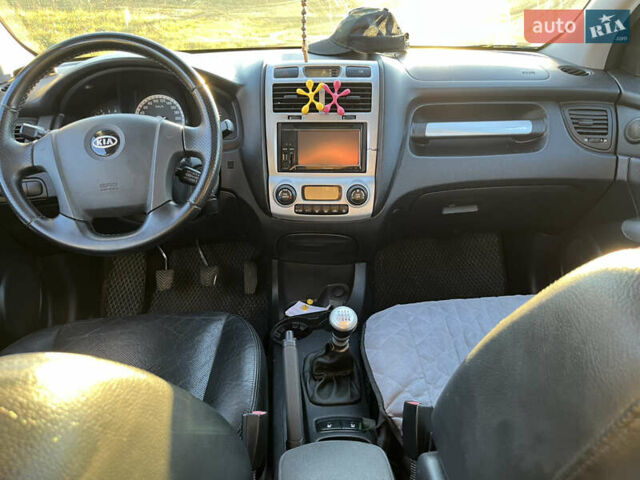 Чорний Кіа Sportage, об'ємом двигуна 1.99 л та пробігом 281 тис. км за 7600 $, фото 10 на Automoto.ua