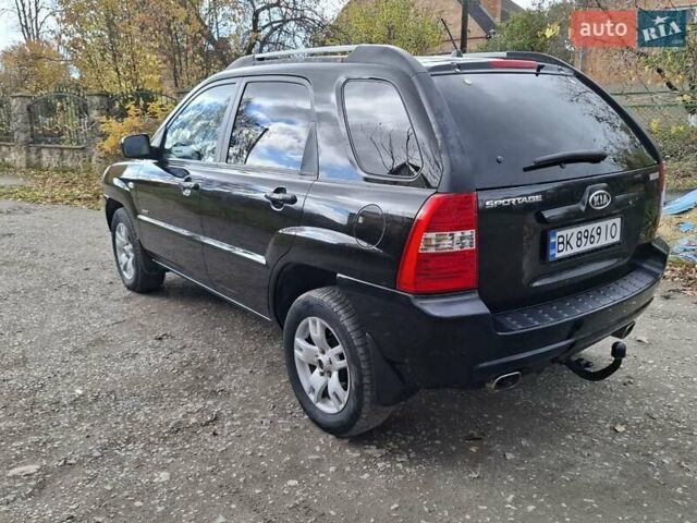 Черный Киа Sportage, объемом двигателя 1.99 л и пробегом 283 тыс. км за 6850 $, фото 6 на Automoto.ua
