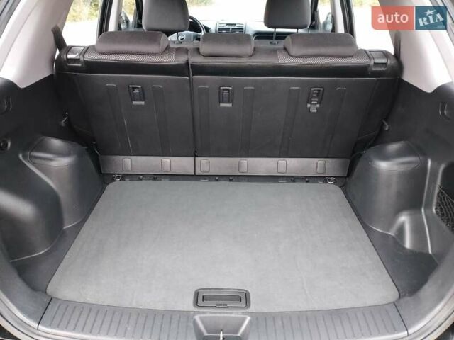 Чорний Кіа Sportage, об'ємом двигуна 2 л та пробігом 150 тис. км за 7000 $, фото 35 на Automoto.ua
